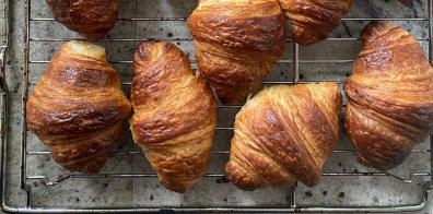 Croissants on baking tray